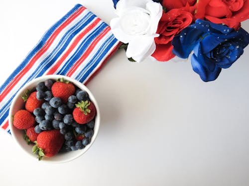 Blueberry and Strawberry Fruit Placed on Bowl