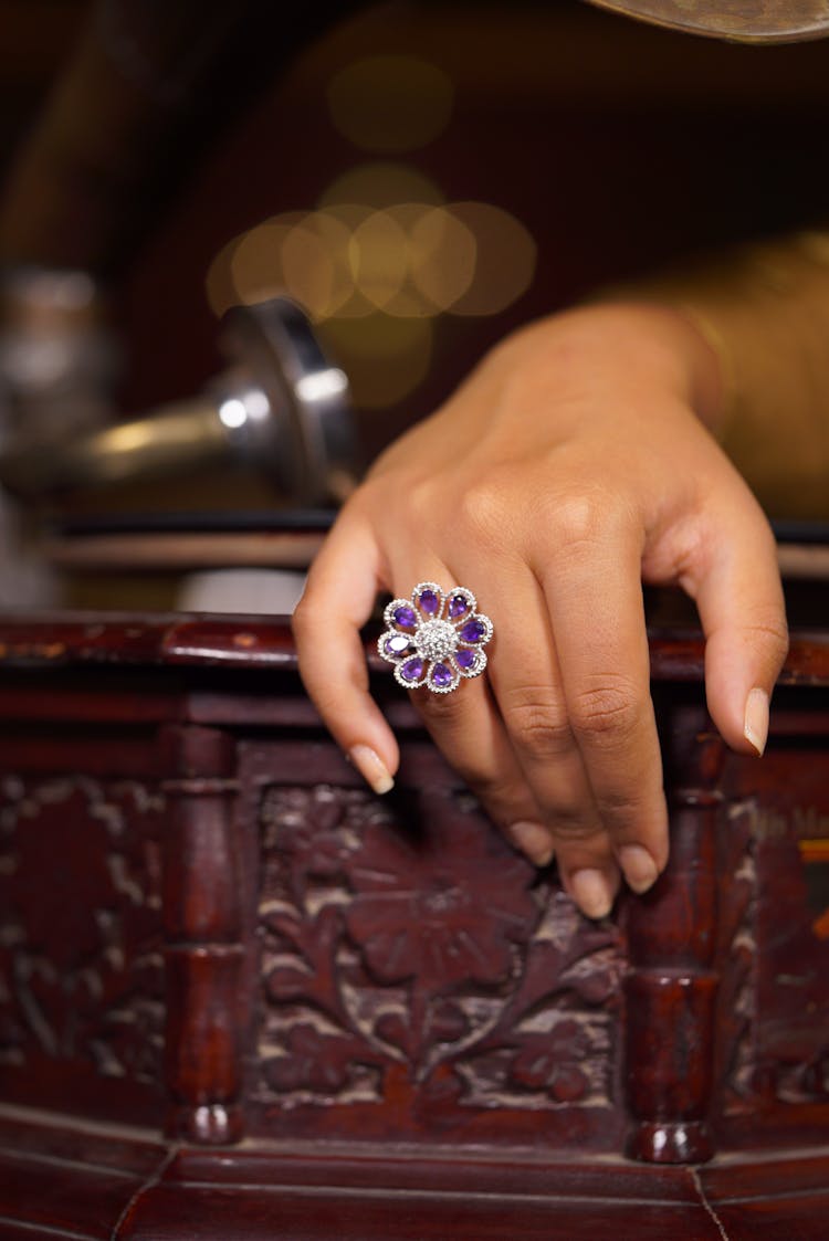 Woman Showing Luxury Flower Shaped Ring