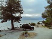 Black Suv Parked on Beach Shore
