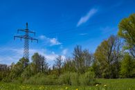 Black Utility Post on Grass Field