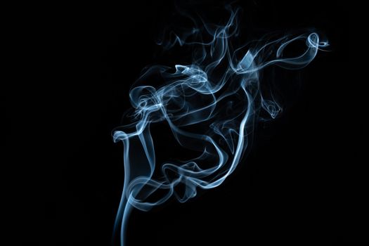 Abstract backdrop of thin blue wavy vapor fluid with shiny surface on black background