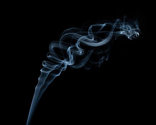 Free Abstract backdrop of thin vapor stream with waves in air on black background Stock Photo