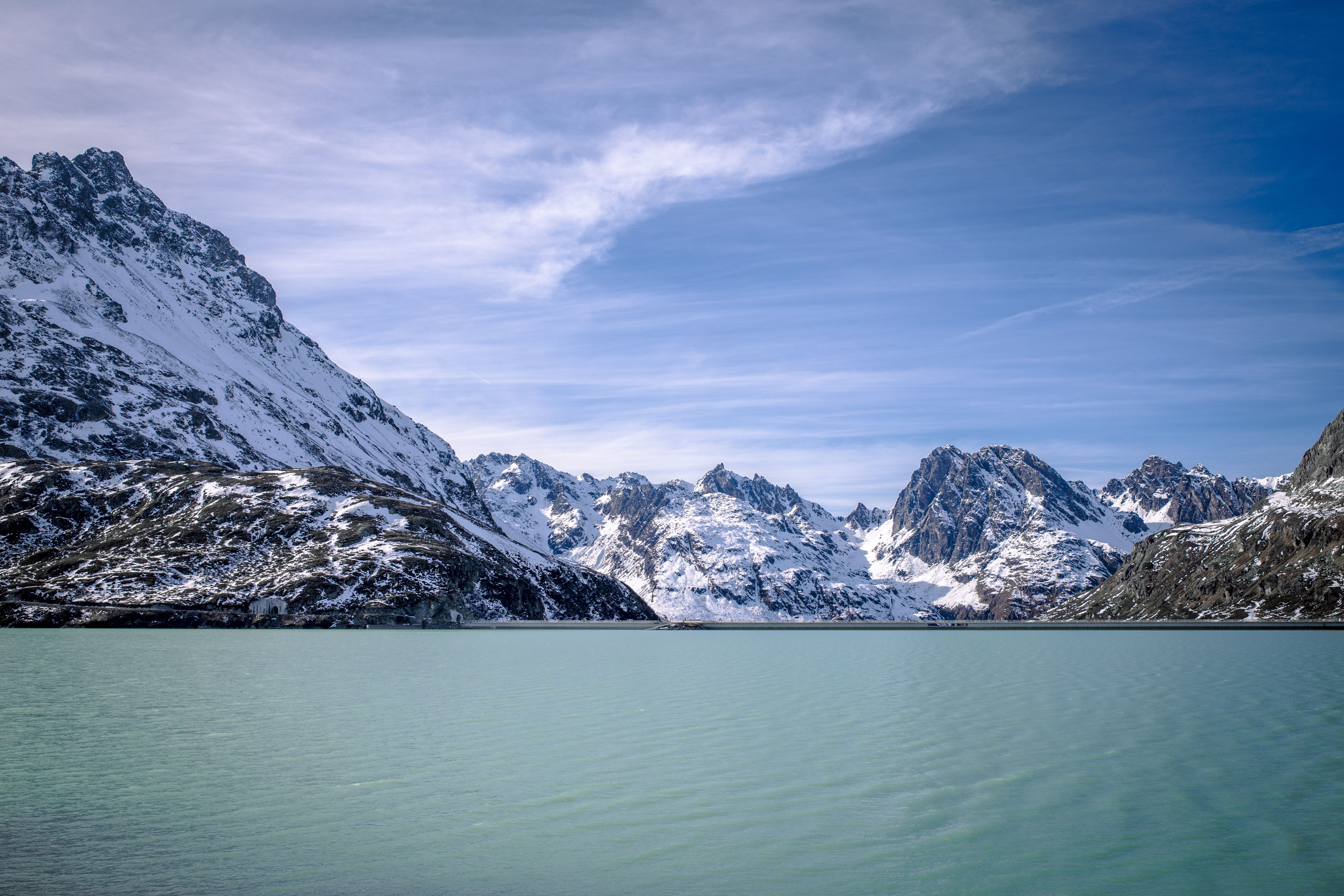 Lake Near Snow Covered Mountains · Free Stock Photo