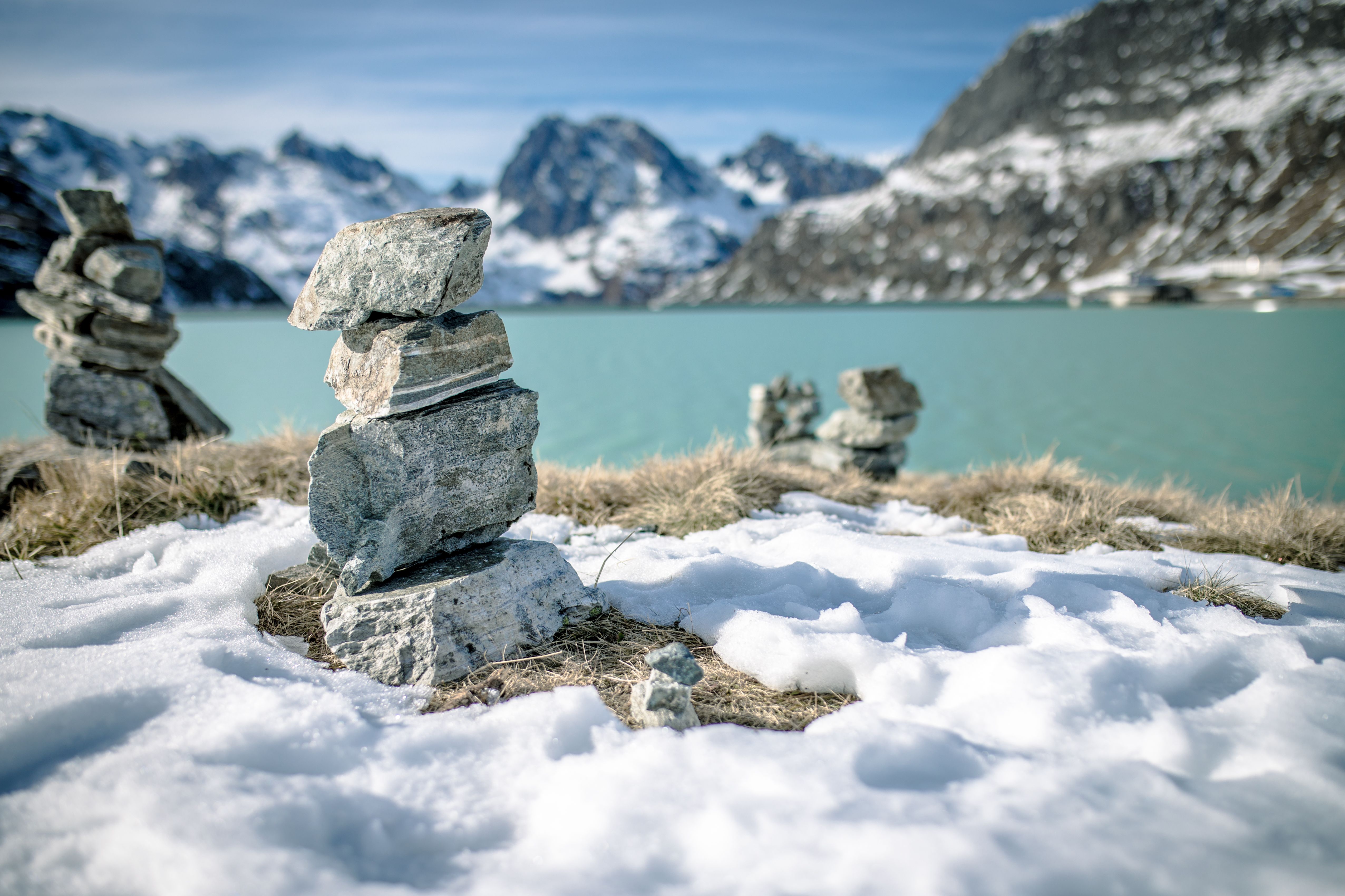 Stacks of Gray Rocks on Snow Covered Ground · Free Stock Photo