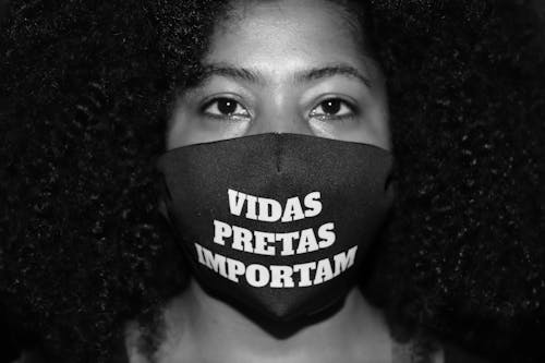Free Photo of Woman Wearing Black Face Mask with Print Stock Photo