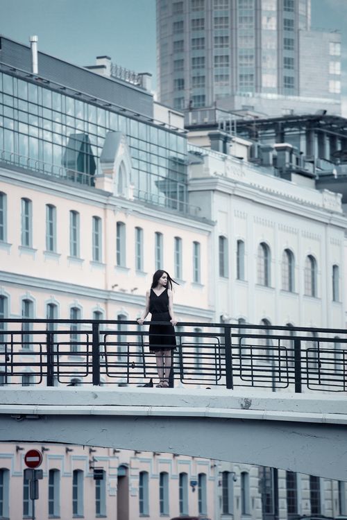 Woman Posing on Bridge · Free Stock Photo