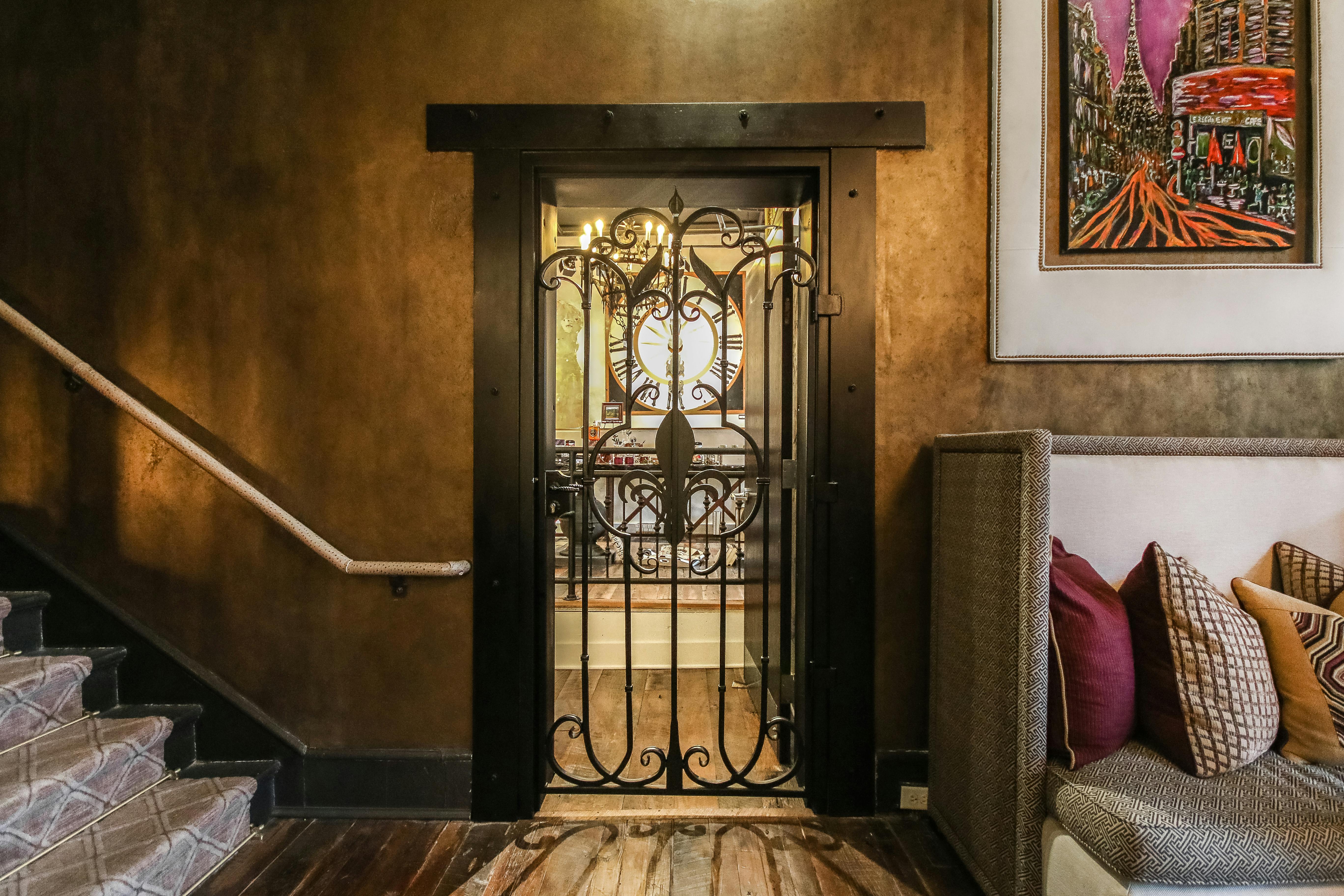 Brown Metal Gate on a Doorway · Free Stock Photo