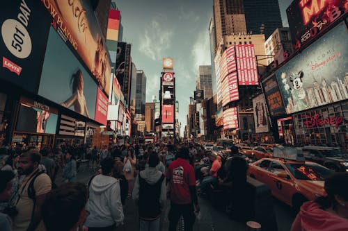People Walking on Times Square Street 