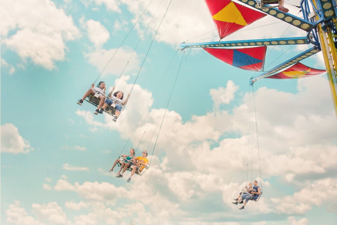 Six Persons Riding Amusement Ride