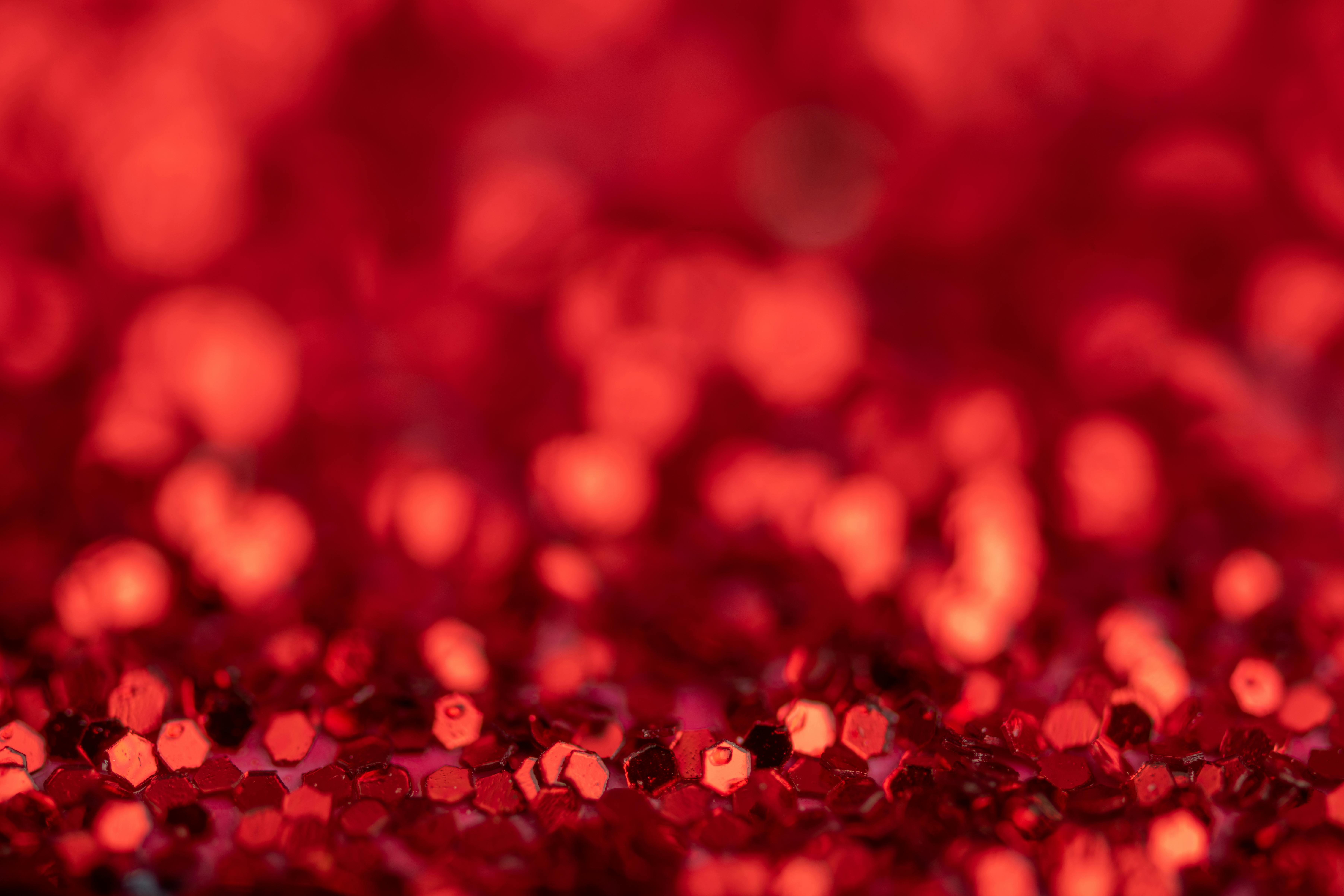 Background of bright shiny vivid red sequins · Free Stock Photo