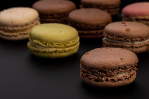 Free Rows of delicious fresh different macaroons Stock Photo
