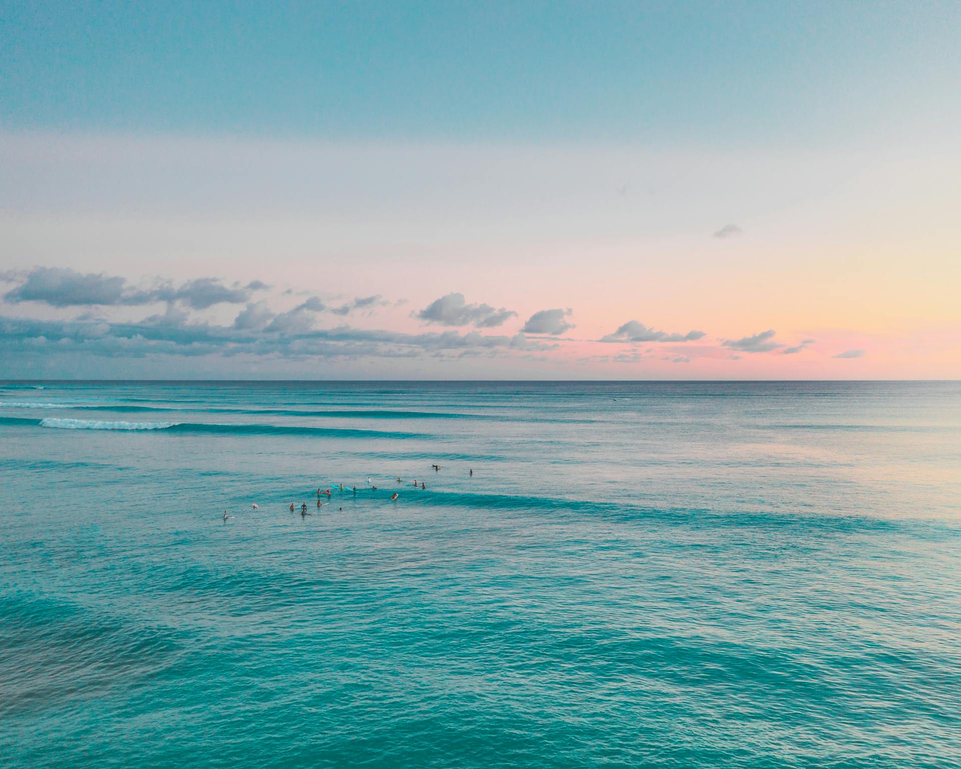 Body of Water Under Blue Sky