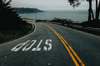 An Asphalt Road with Road Sign