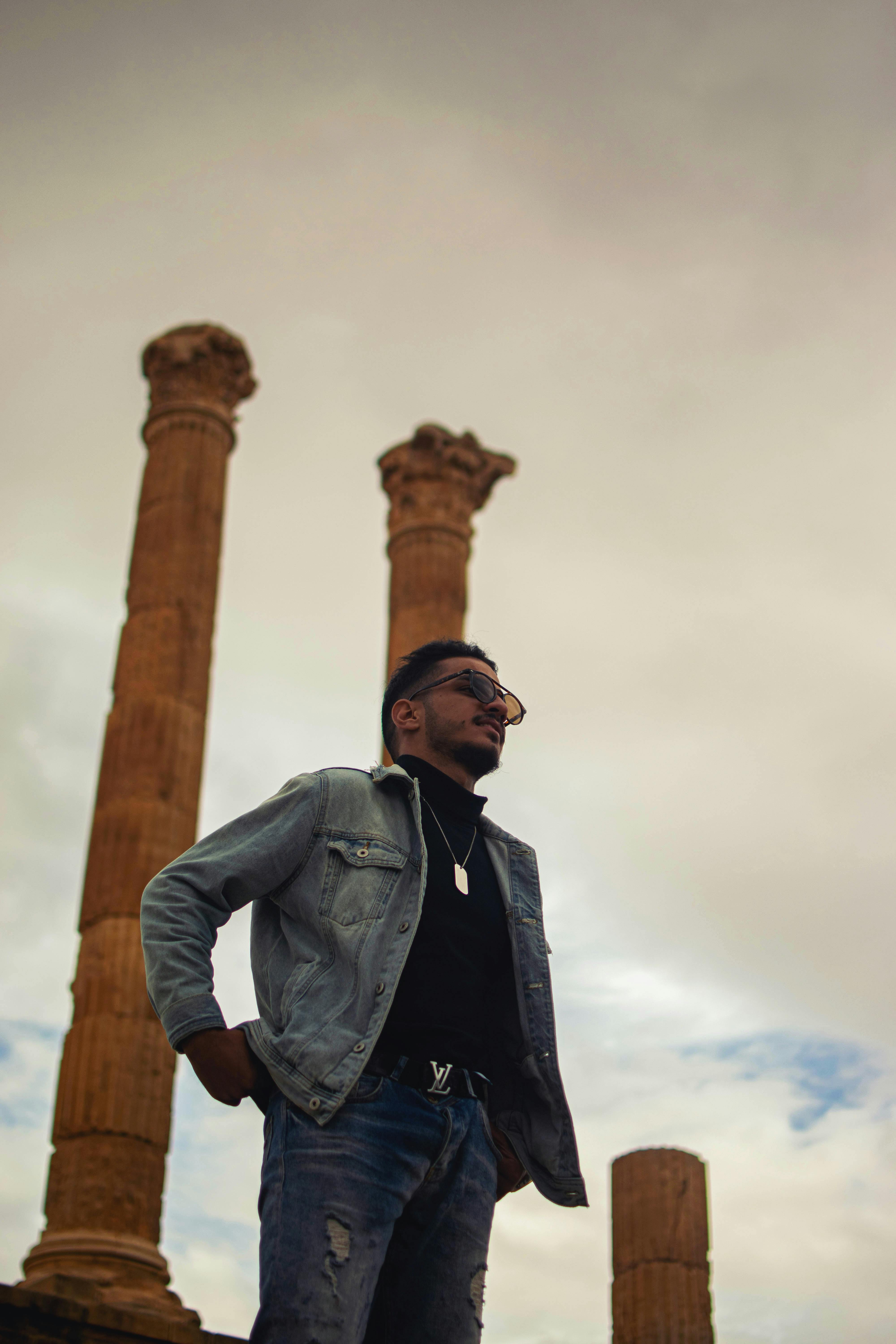 Low-Angle Shot of Male Model Wearing Denim Jacket and Denim Jeans