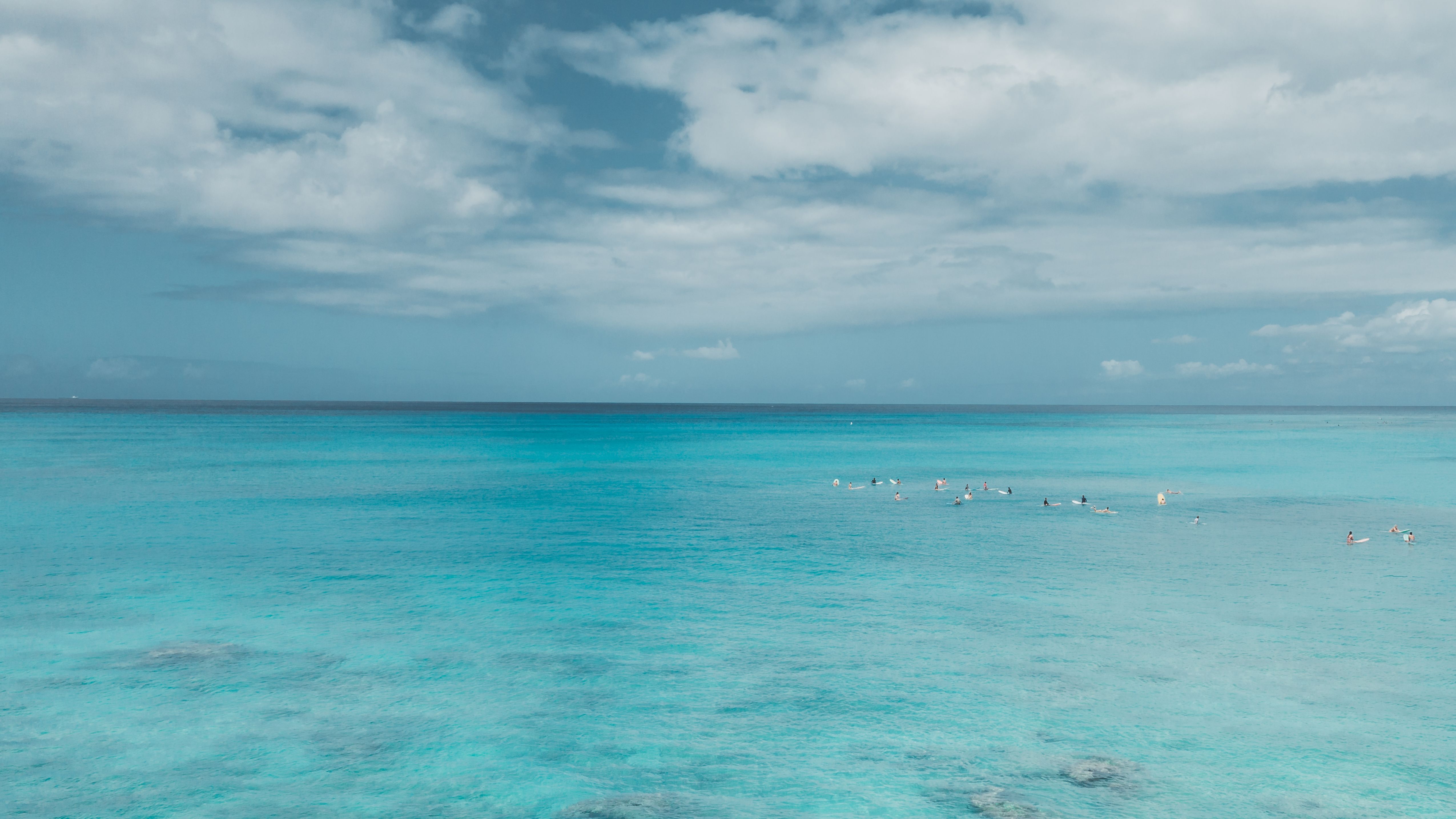 Blue Ocean Under Blue Sky and White Clouds · Free Stock Photo
