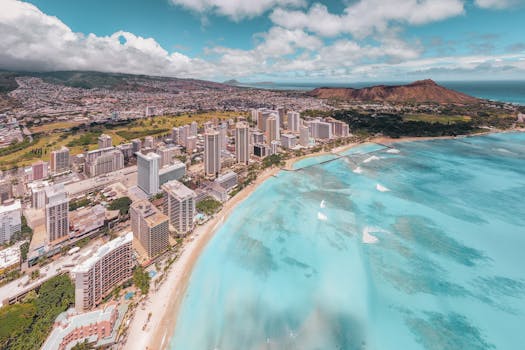 Breathtaking aerial view of Waikiki Beach, Honolulu, capturing the vibrant city against Diamond Head in Hawaii.