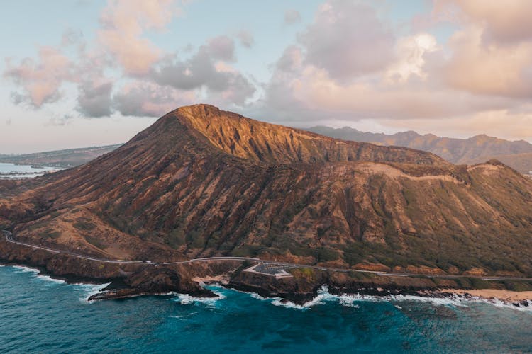 Scenic View Of A Volcano Near An Ocean