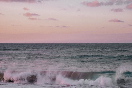 Ocean Waves Under Blue Sky