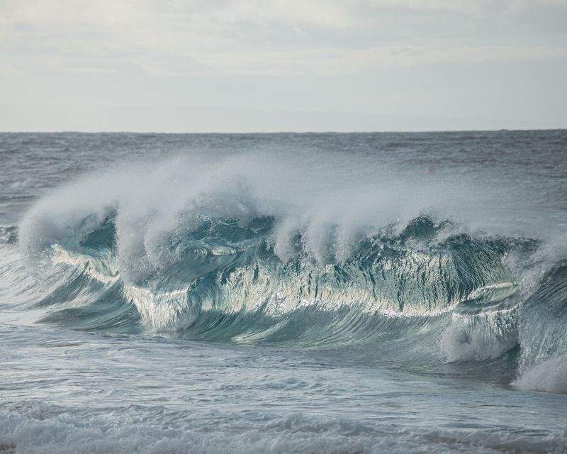 Stunning capture of ocean waves crashing, showcasing the power of the sea.