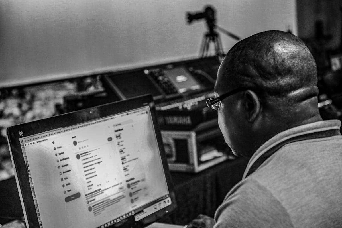 Veterinarian checking dog's weight