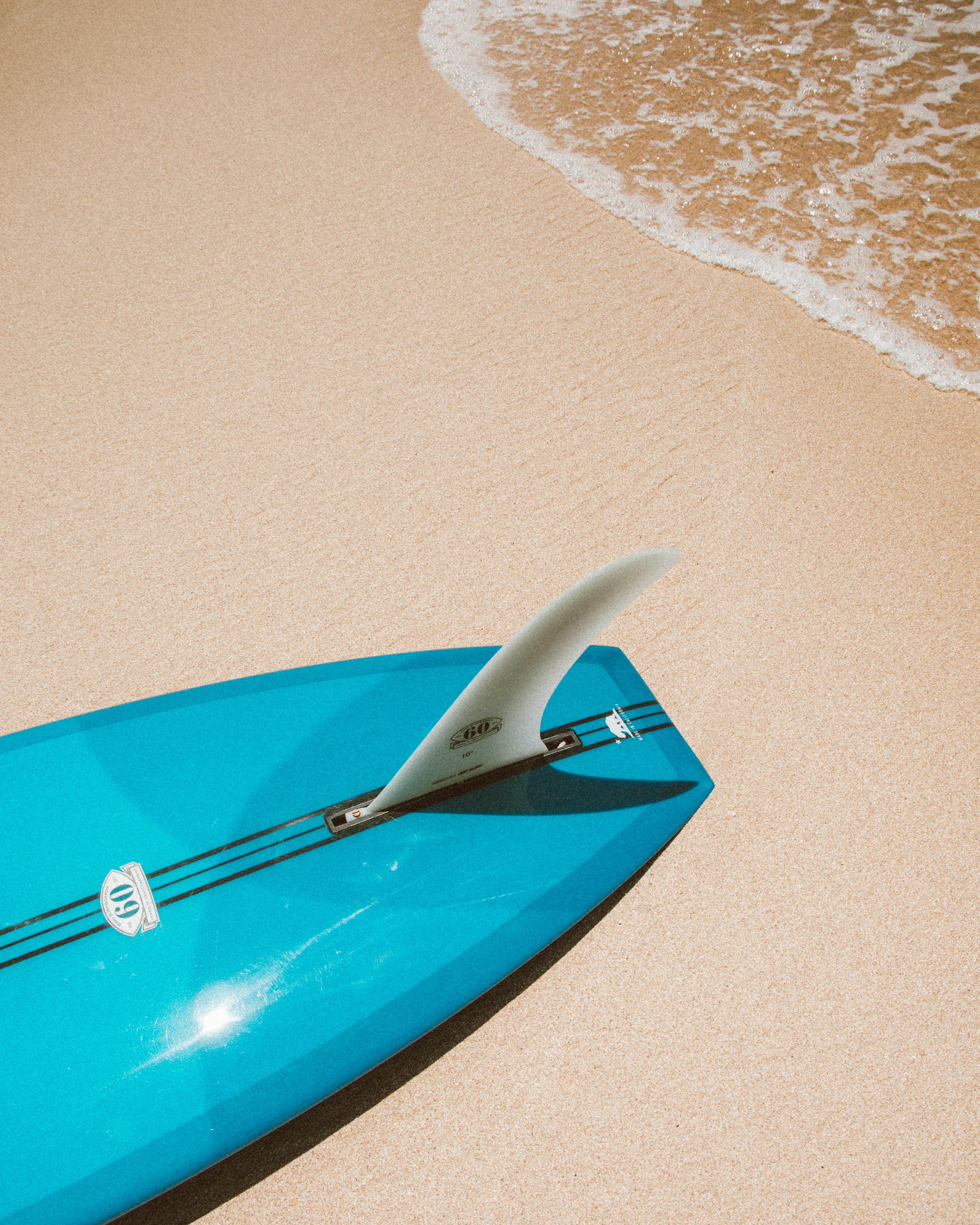 surfboards in the sand