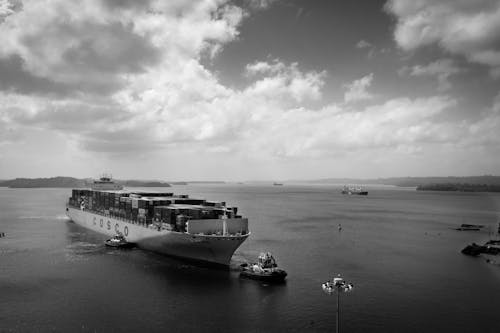 Free Big cargo ship floating on river Stock Photo