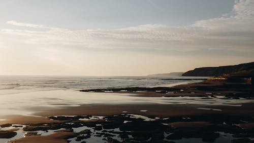 Scenic hilly seacoast near calm sea