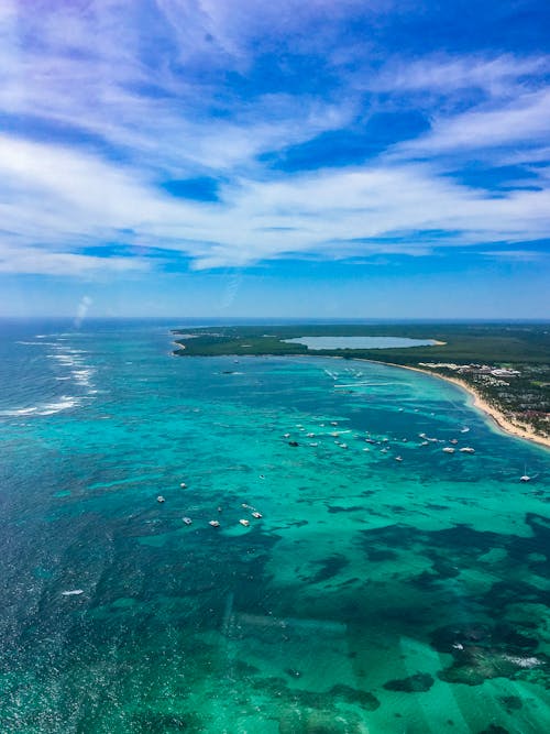 Foto profissional grátis de à beira-mar, aéreo, água