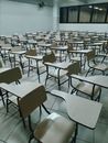 Rows of identical desks in school