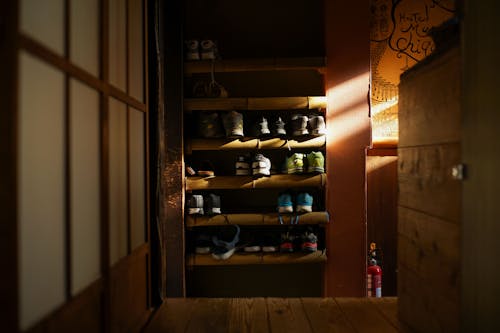Sneakers on a Rack Made of Bamboo