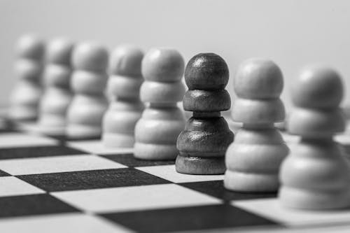 Grayscale Photo of a Pawn