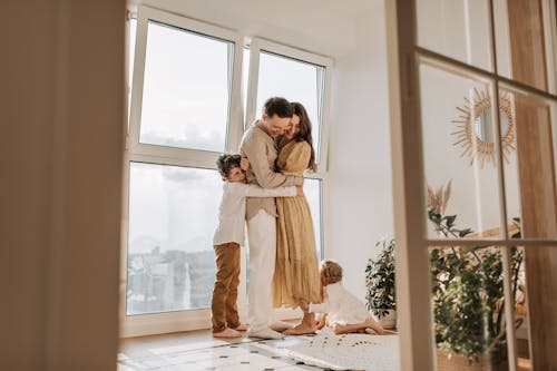 Free Happy Family Hugging Stock Photo