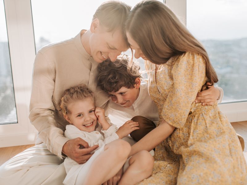 Happy family together representing family visa services