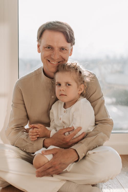 Free Father Sitting with his Daughter Stock Photo