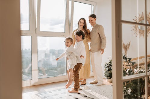 A Family Playing at the Living Room