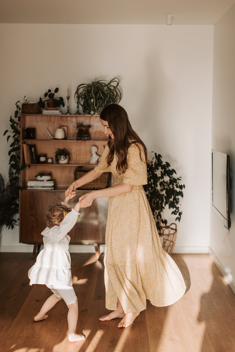 Mother And Daughter Dancing