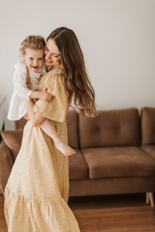 A Woman Carrying a Child