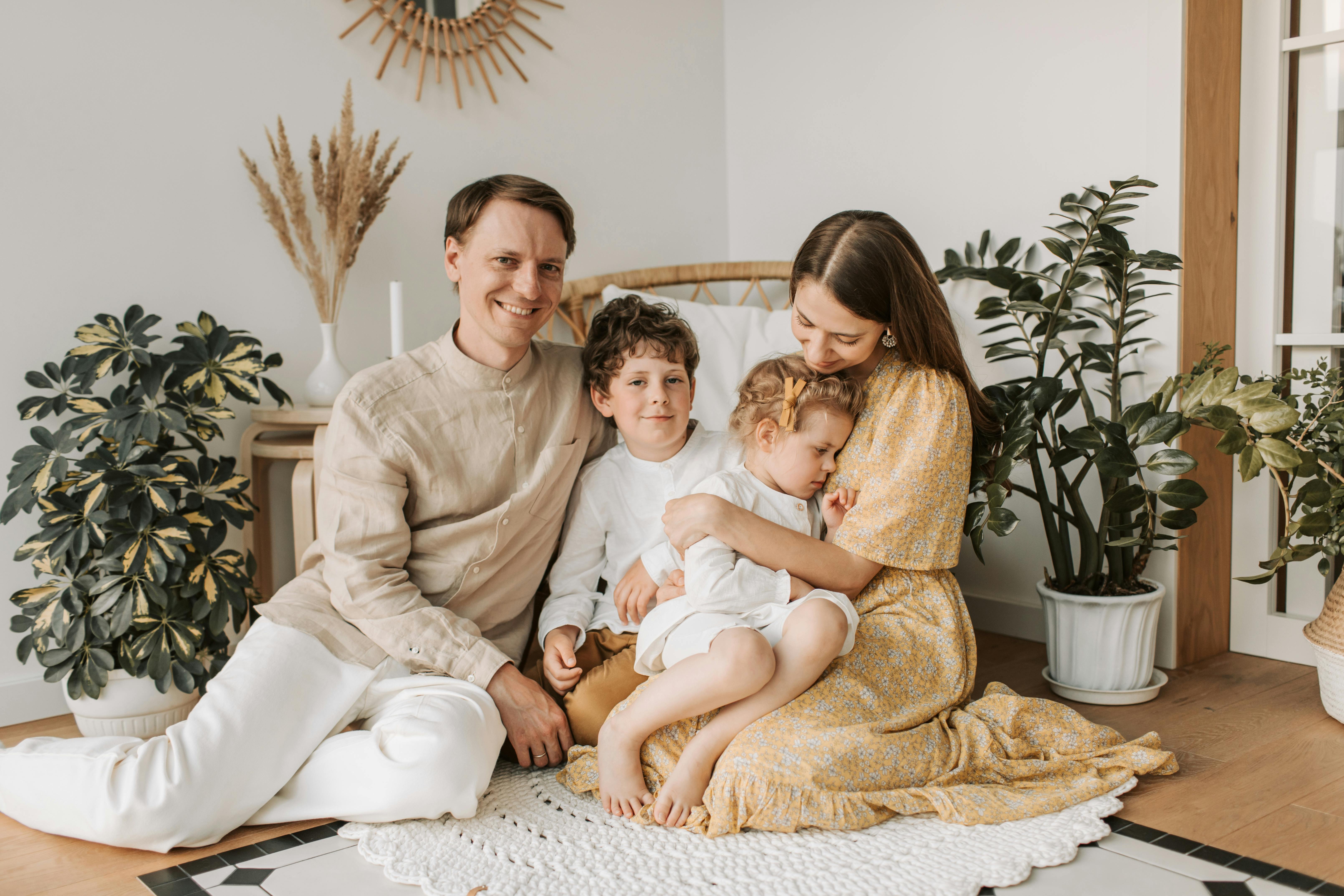 a family sitting on floor