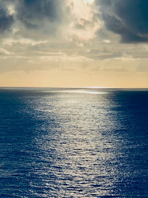 Blue Sea Under Cloud Formation