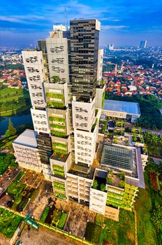 Stunning drone shot capturing a contemporary building in Banten's urban landscape. - Fotografer Sidoarjo