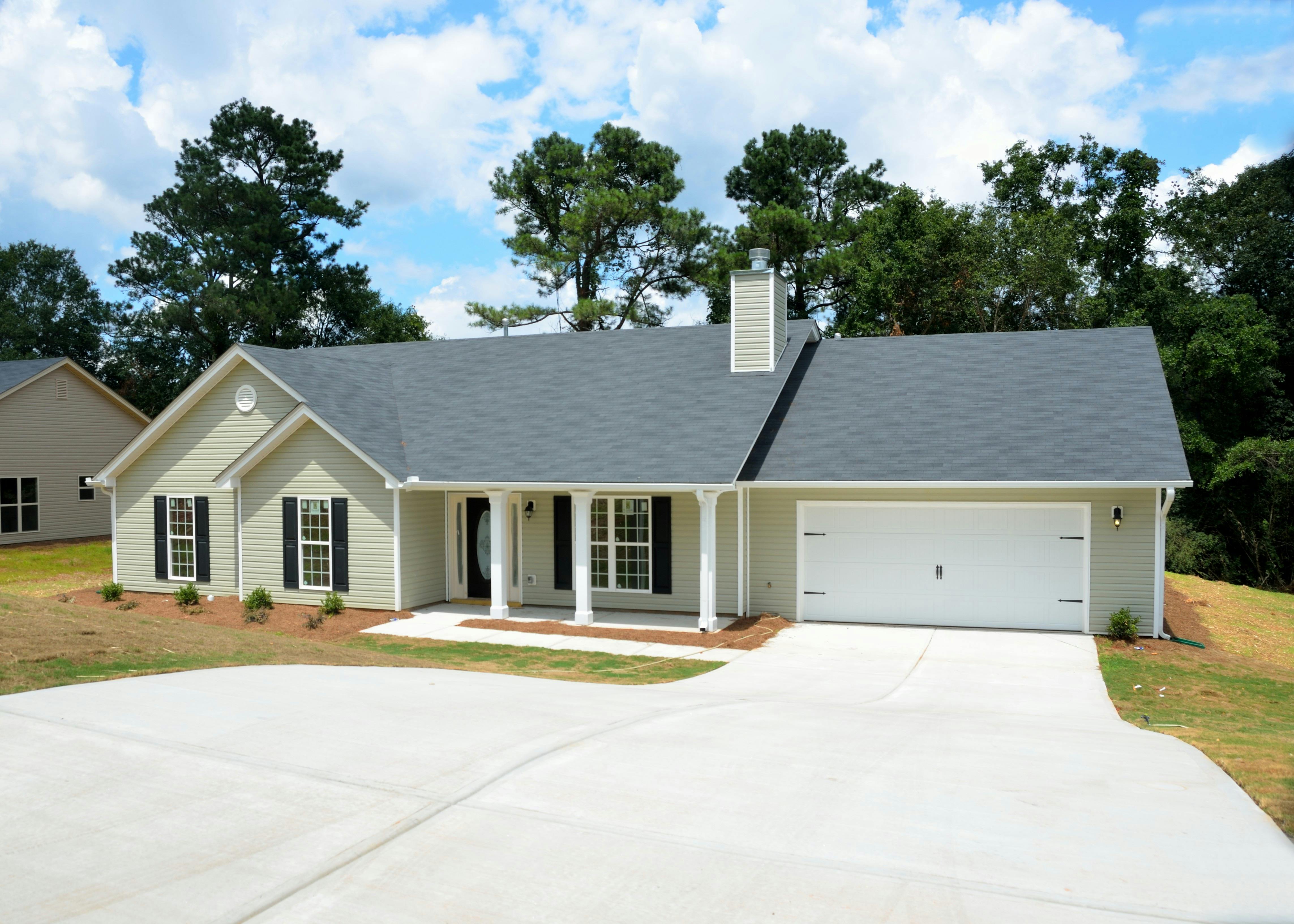 Gray 2 Storey House  at Daytime  Free Stock Photo