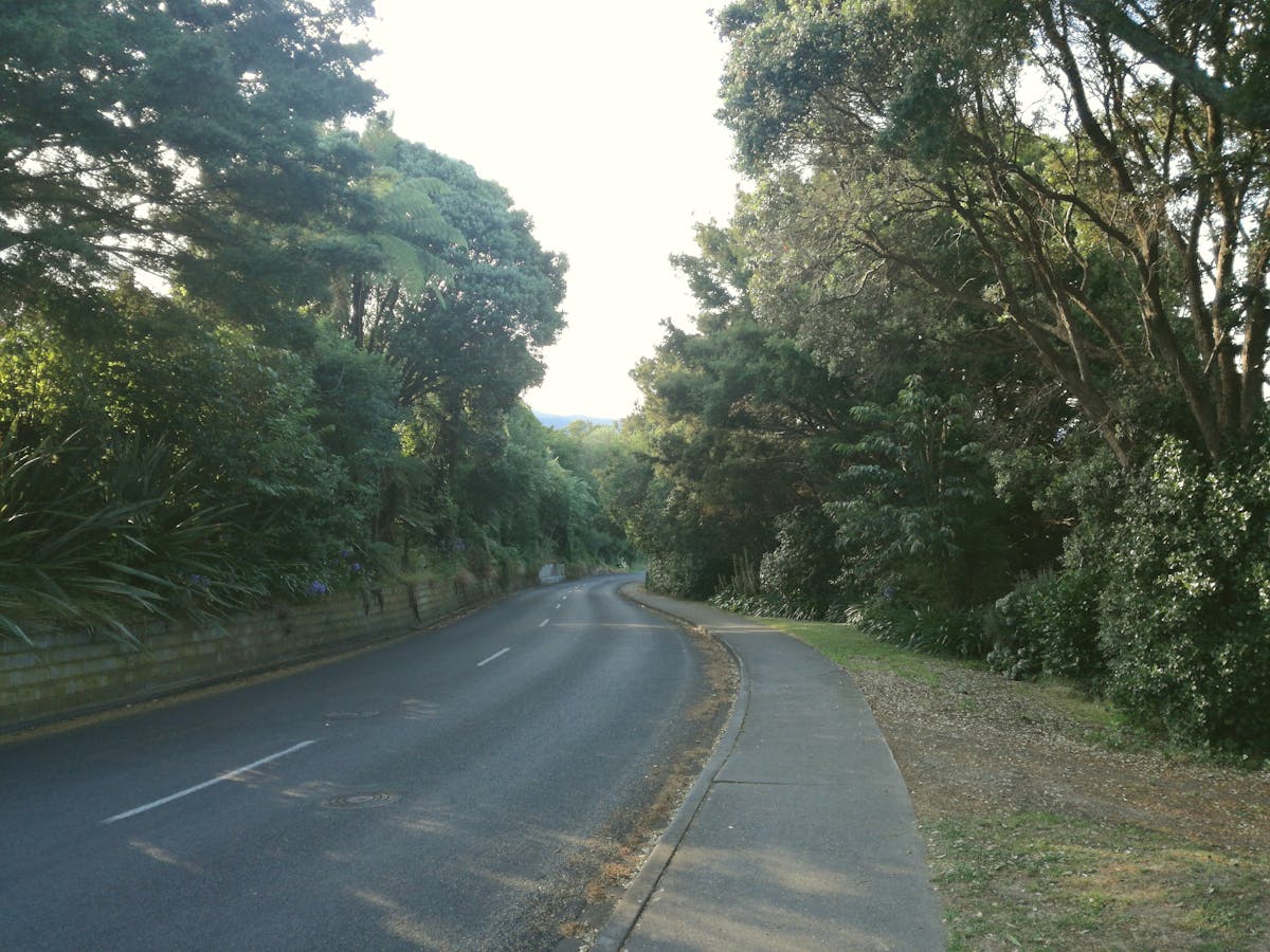Mother and adult son laughing and dancing together at a celebration