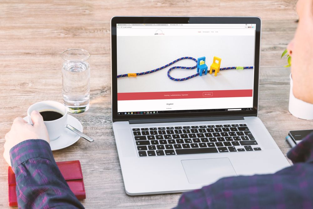 Website displayed on a laptop