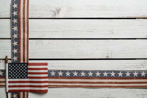 Wooden board with United States flag decorations