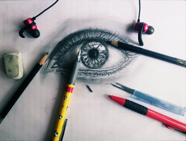 An Eye Sketching On Paper