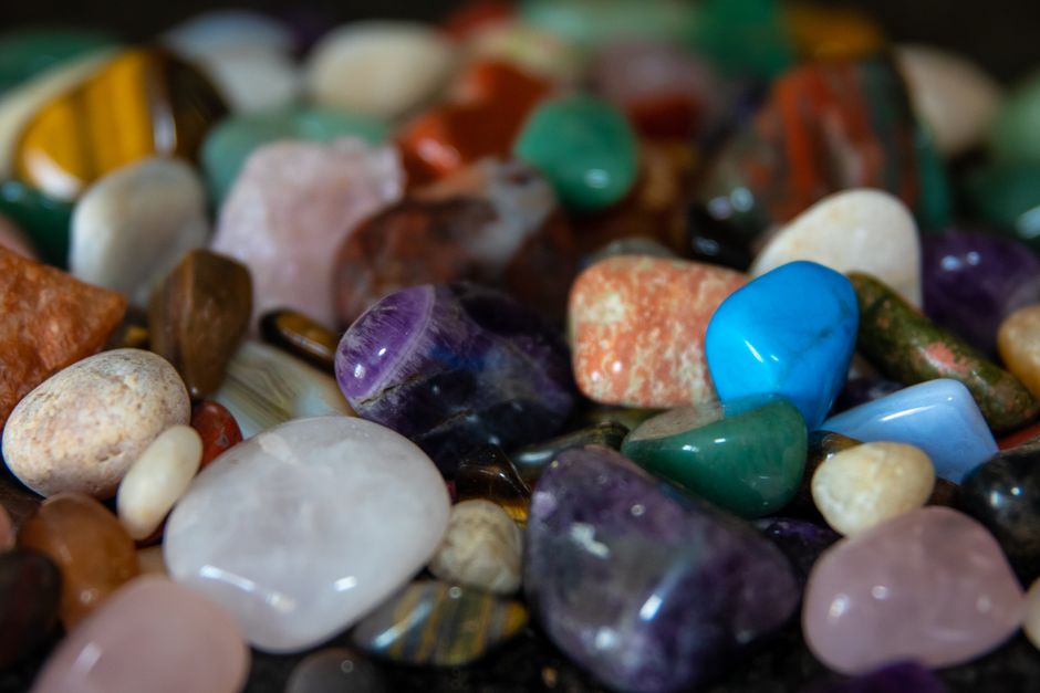colorful array of different popular gemstones like amber, amethyst, and larimar - authentic stone jewelry colorful array of different popular gemstones like amber, amethyst, and larimar - authentic stone jewelry