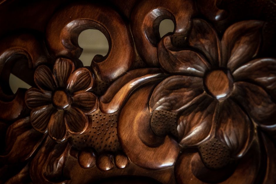 carved wooden accent table showcasing beautiful natural textures carved wooden accent table showcasing beautiful natural textures