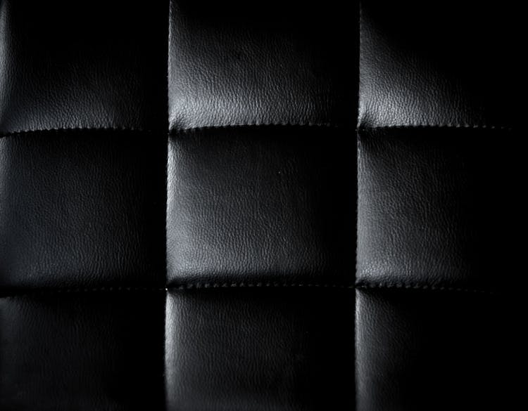 Black Leather Fabric In Close Up Photography