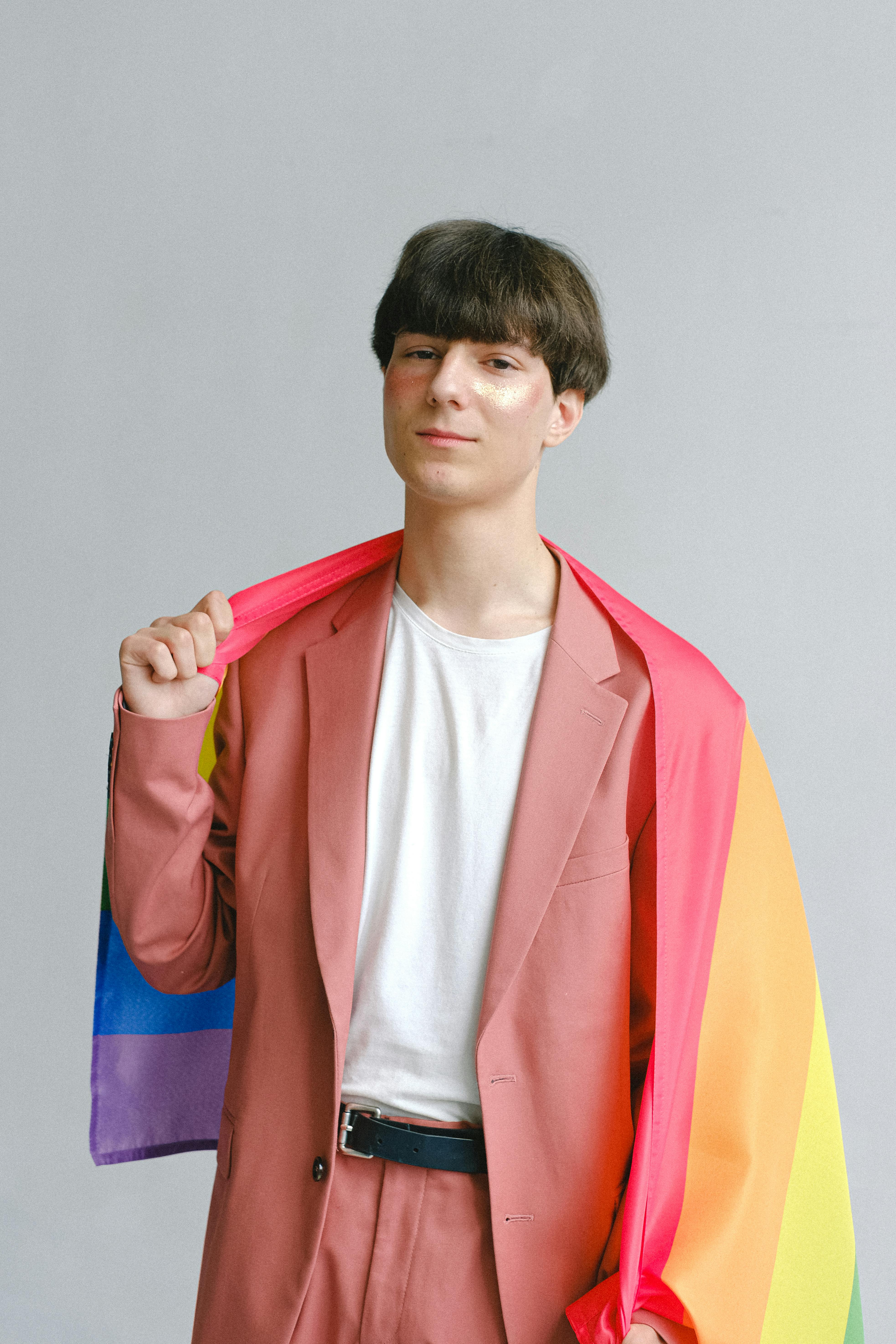 man holding pride flag