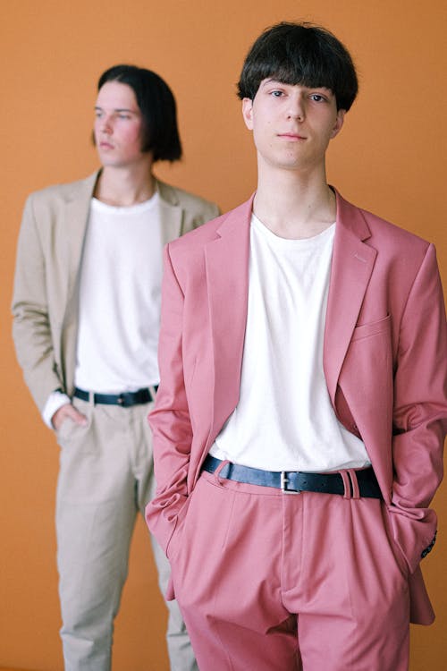 Two Short Haired Men in Colored Suits